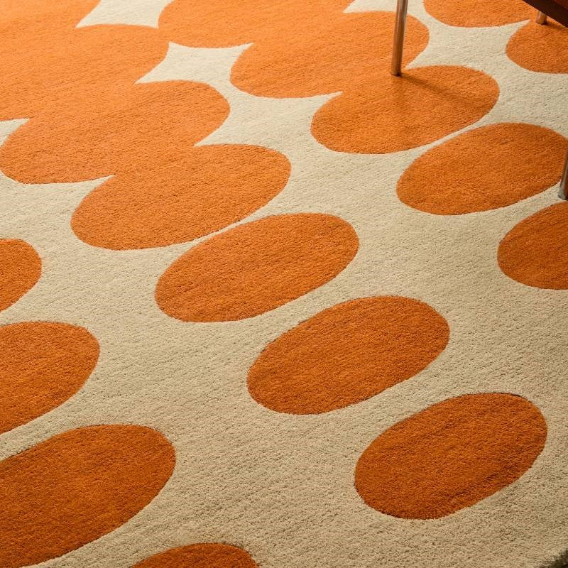 Optical Oval Rug in orange, cream