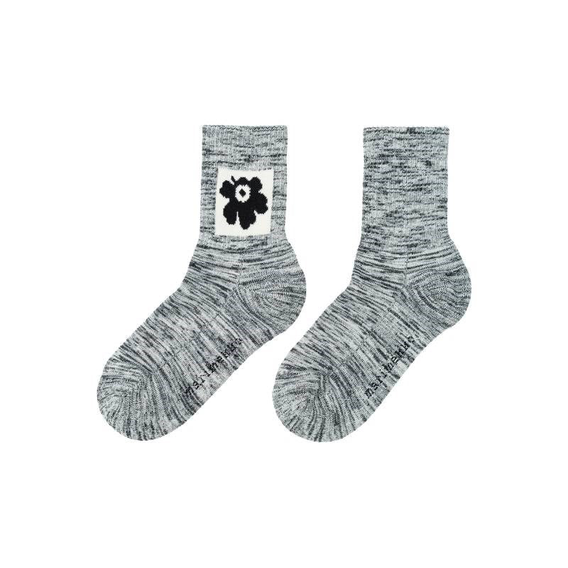Puikea Unikko Kioski Socks in black, white