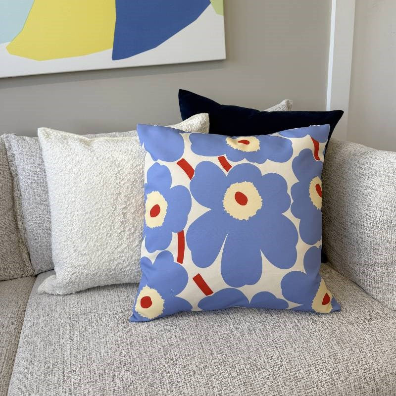 Pieni Unikko Outdoor Cushion Cover 50cm in off white, light blue, melon, orange red